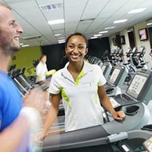 Chichester gym member running on treadmill