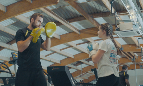 Beth Samsa boxing with personal trainer Michael Bell