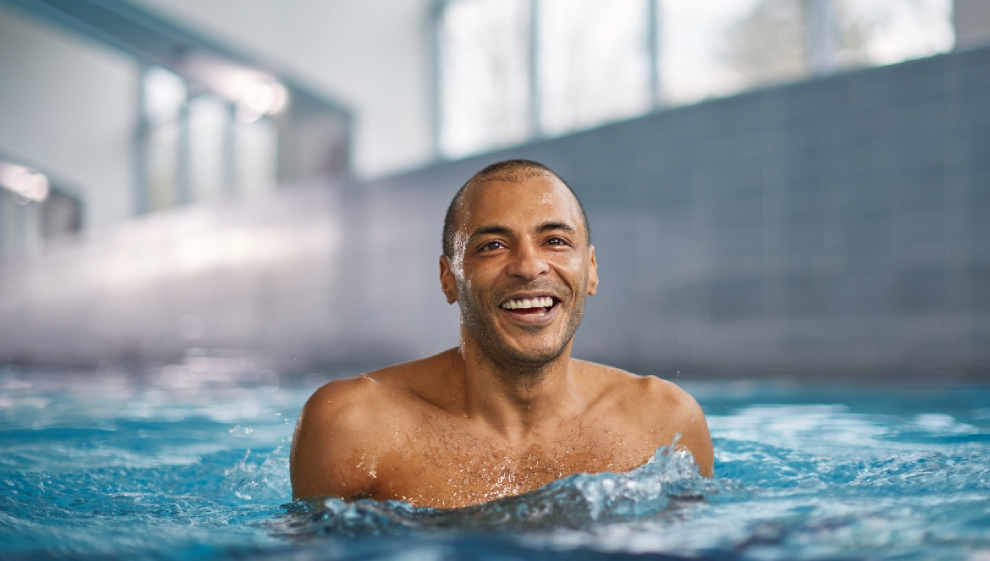 A man swimming at his local fitness and wellbeing centre