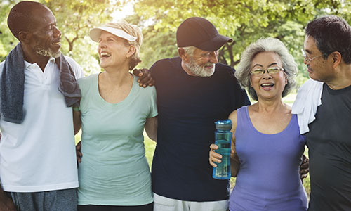 A group of retirees relax after a walk