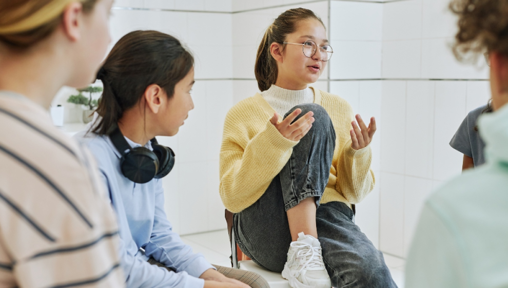 Teenage girls discussing exercise and sport