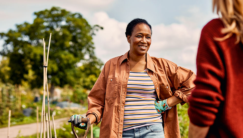 Two women talking in an allotment