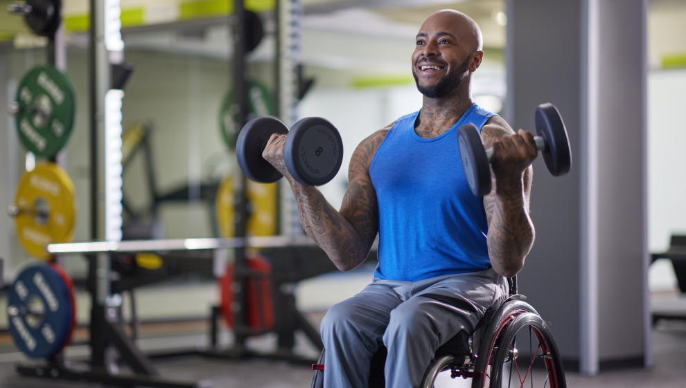 A man lifting weights in the gym