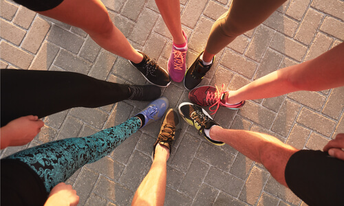 Runners' feet in a circle viewed from above