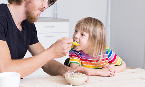 Child eating porridge