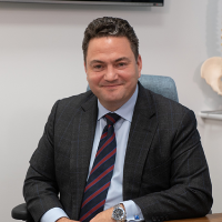 Mr Dean Michael, Consultant Hip & Knee Surgeon at the Surrey Orthopaedic Clinic