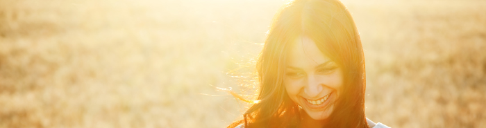 Woman smiling in the sunshine