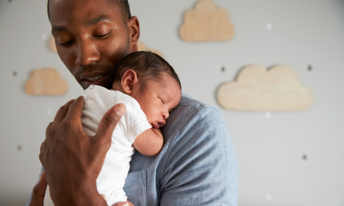 Father holding baby