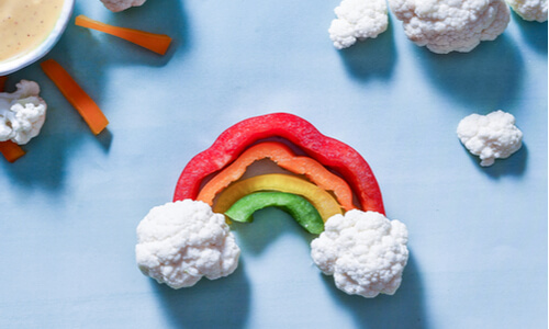 Vegetables arranged into a rainbow