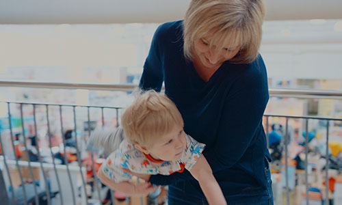 Wendy plays with her grandson