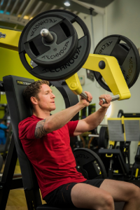 Intense barbell workout in the gym